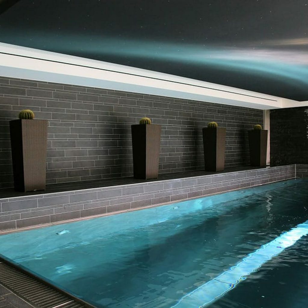 Piscine miroir à débordement - Designo Pool en Suisse Romande